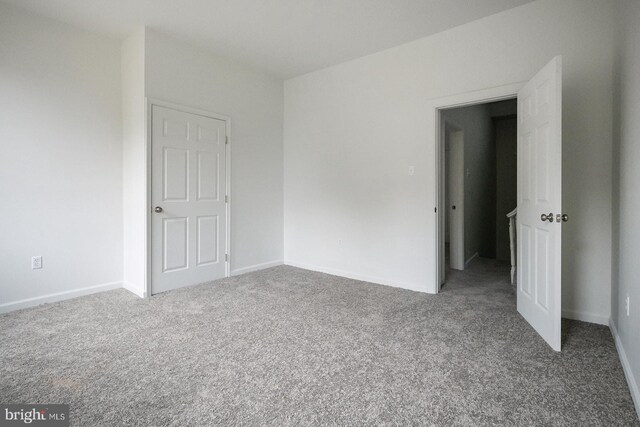 3923 Brown St, Philadelphia, PA 19104 - unfurnished bedroom with baseboards and carpet