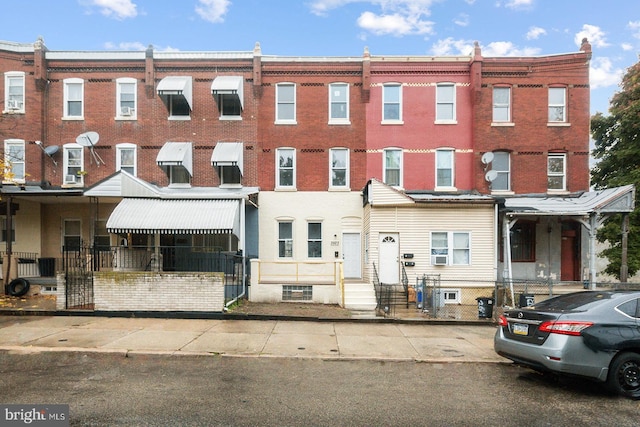 3923 Brown St, Philadelphia, PA 19104 - view of front of property with brick siding, entry steps, and fence