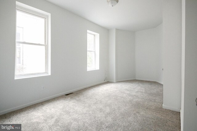 3923 Brown St, Philadelphia, PA 19104 - carpeted empty room with visible vents and baseboards