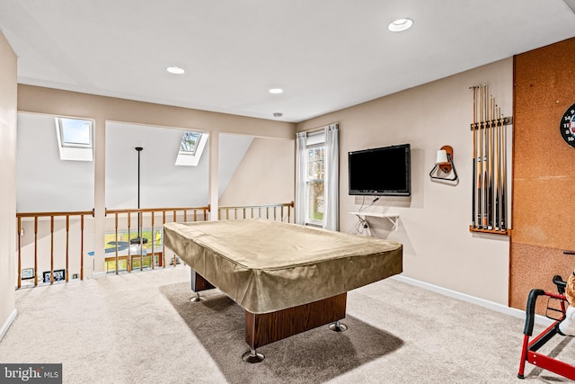 playroom featuring a skylight, carpet flooring, baseboards, and recessed lighting
