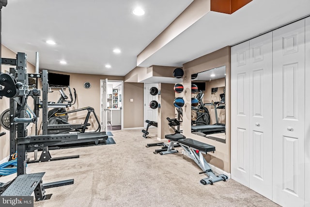 exercise area featuring recessed lighting, baseboards, and carpet floors