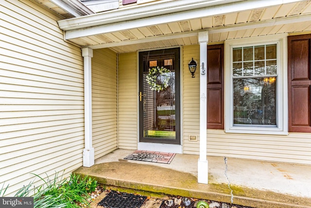 property entrance featuring covered porch