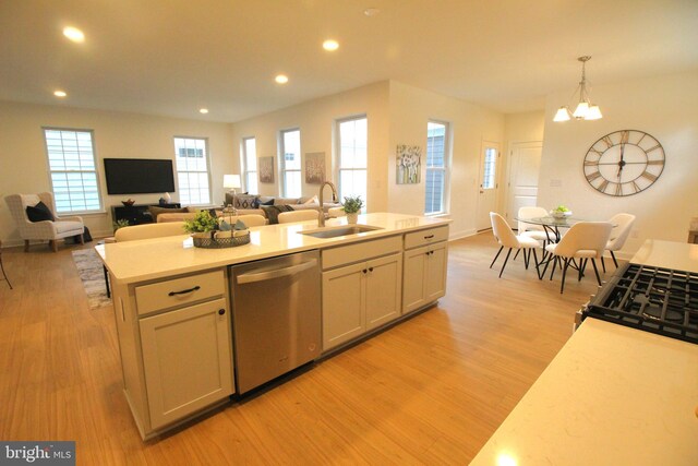 1609 Schwinn St, Middletown, DE 19709 - kitchen with light countertops, a sink, recessed lighting, light wood-style floors, and dishwasher