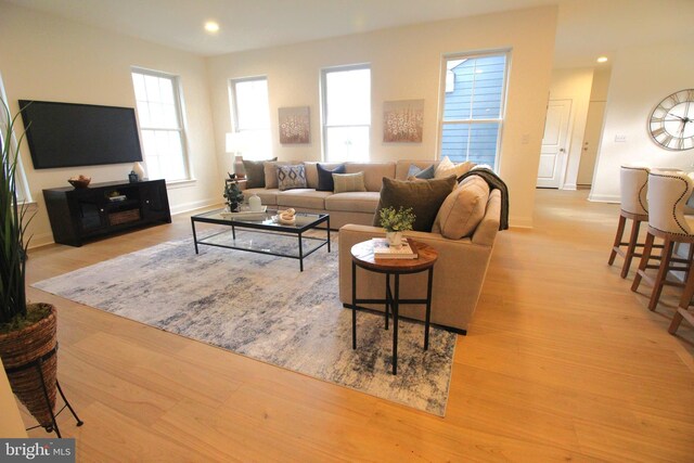 1609 Schwinn St, Middletown, DE 19709 - living area featuring light wood finished floors, baseboards, and recessed lighting