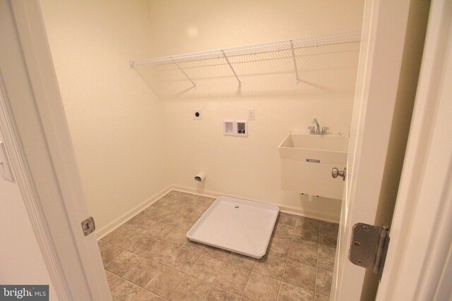 1609 Schwinn St, Middletown, DE 19709 - laundry room with laundry area, hookup for an electric dryer, a sink, hookup for a washing machine, and baseboards