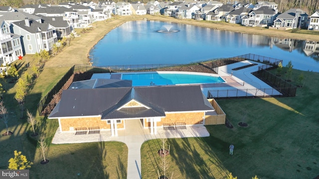 14447 Creekside Xing, Selbyville, DE 19975 - aerial perspective of suburban area featuring a nearby body of water and a pool area