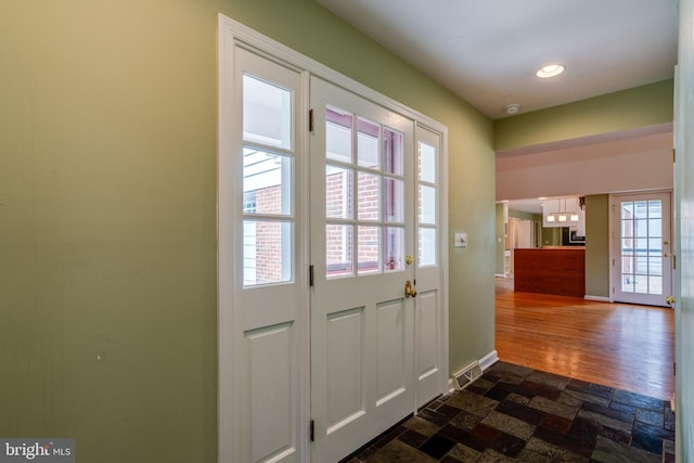 1428 Center Rd, Lancaster, PA 17603 - doorway with baseboards, dark stone finish floors, and recessed lighting