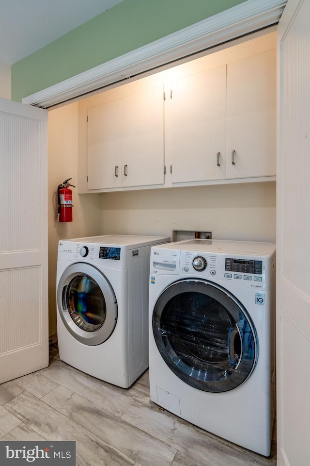 1428 Center Rd, Lancaster, PA 17603 - laundry area with cabinet space and washer and clothes dryer