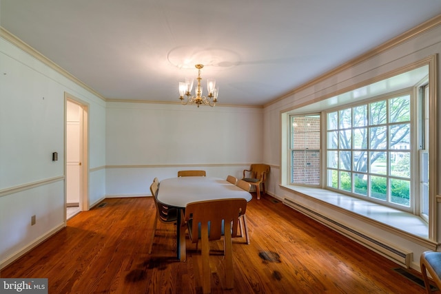 1428 Center Rd, Lancaster, PA 17603 - dining room with a chandelier, crown molding, wood finished floors, and a baseboard heating unit