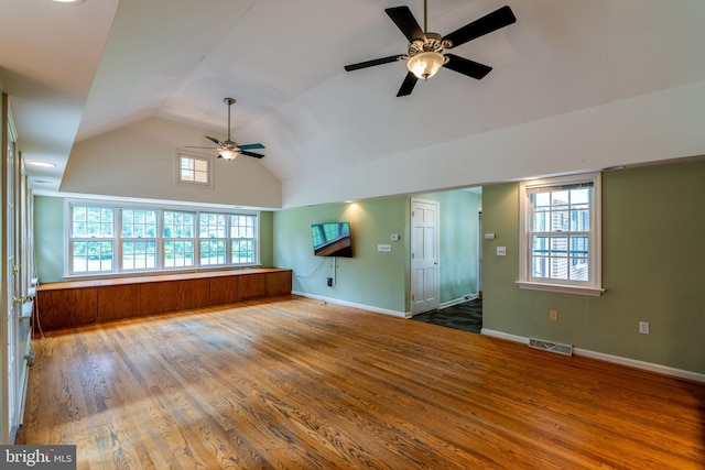 1428 Center Rd, Lancaster, PA 17603 - unfurnished living room with a ceiling fan, wood finished floors, high vaulted ceiling, and baseboards