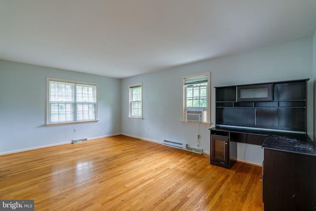 1428 Center Rd, Lancaster, PA 17603 - unfurnished office featuring light wood finished floors, cooling unit, baseboards, and a baseboard radiator