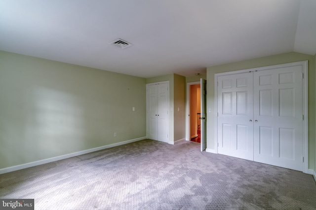 1428 Center Rd, Lancaster, PA 17603 - unfurnished bedroom featuring two closets, carpet flooring, and baseboards