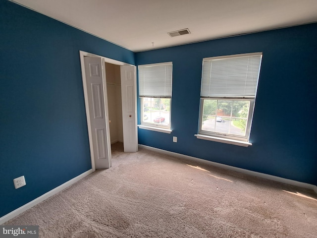 1310W Sheridan Pl Unit 301, Bel Air, MD 21015 - unfurnished bedroom featuring carpet floors, baseboards, and a closet