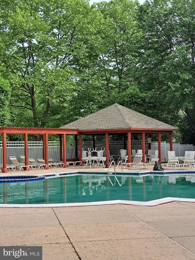 1310W Sheridan Pl Unit 301, Bel Air, MD 21015 - view of pool featuring fence, a patio, a gazebo, and view of scattered trees