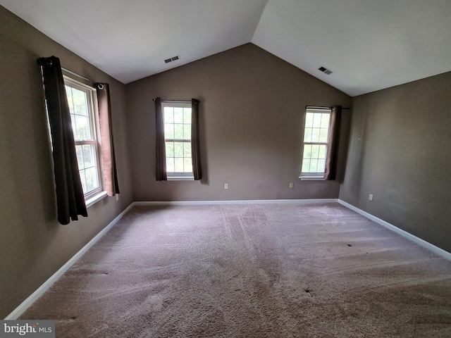 1310W Sheridan Pl Unit 301, Bel Air, MD 21015 - unfurnished room featuring vaulted ceiling, plenty of natural light, baseboards, and carpet floors