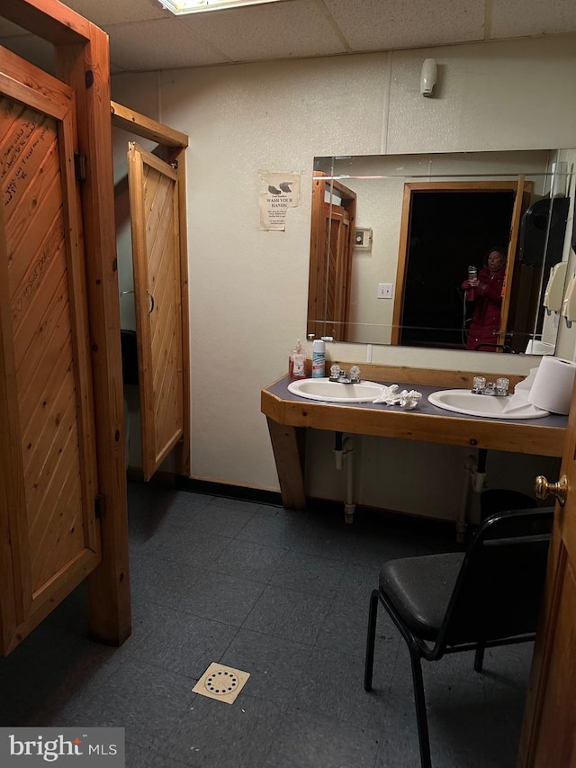 6573 Raystown Rd, Hopewell, PA 16650 - bathroom with a sink, tile patterned floors, a drop ceiling, and baseboards