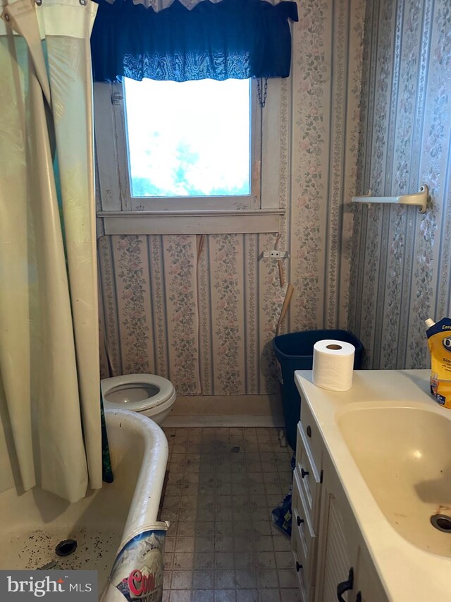 6573 Raystown Rd, Hopewell, PA 16650 - bathroom with tile patterned floors, toilet, a shower with shower curtain, and vanity