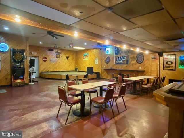 6573 Raystown Rd, Hopewell, PA 16650 - interior space featuring wooden walls, a drop ceiling, and concrete flooring
