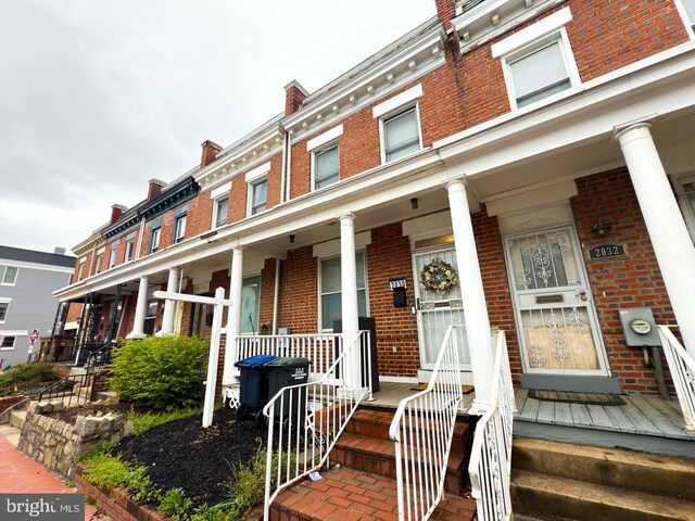 2030 4th St NW, Washington, DC 20001 - view of front of property with a porch and brick siding