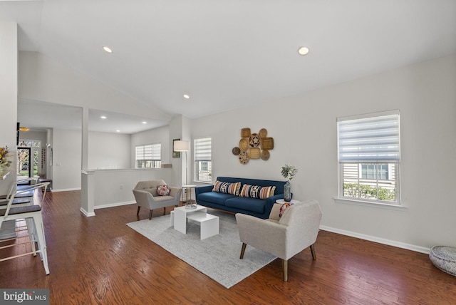 living area with wood finished floors, baseboards, lofted ceiling, and recessed lighting