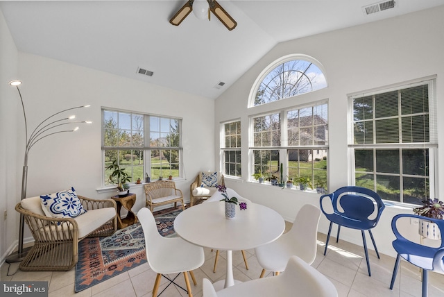 sunroom / solarium featuring visible vents