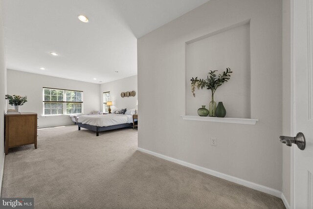 bedroom with baseboards, carpet, and recessed lighting