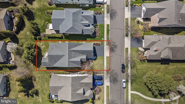 drone / aerial view with a residential view