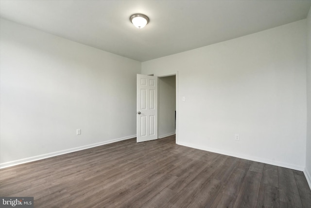 517 N 64th St, Philadelphia, PA 19151 - spare room with baseboards and dark wood-style floors