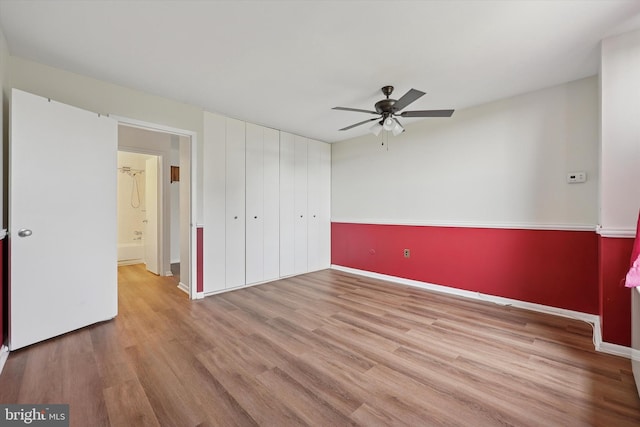 6100 Henry Ave Unit 7D, Philadelphia, PA 19128 - unfurnished bedroom with wood finished floors, baseboards, a closet, and a ceiling fan