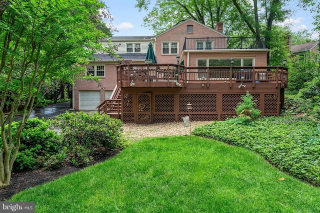 back of house with a balcony, brick siding, a deck, and a garage