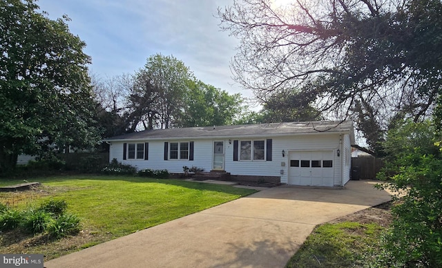 single story home with driveway, entry steps, a front yard, an attached garage, and fence