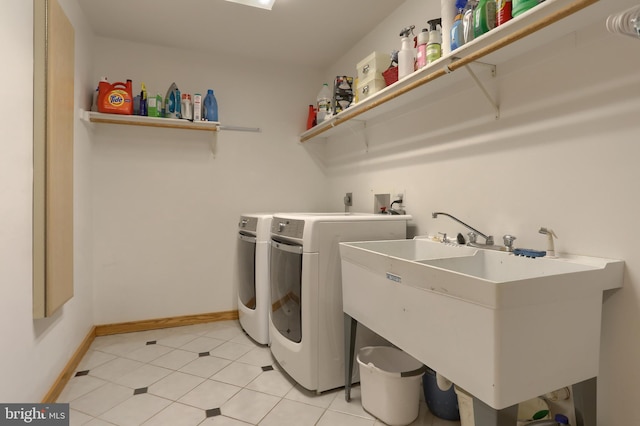 1023 Fairdell Dr, Hummelstown, PA 17036 - laundry area with baseboards, washer and dryer, and light tile patterned flooring