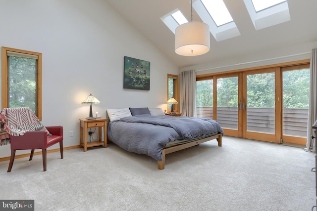 1023 Fairdell Dr, Hummelstown, PA 17036 - bedroom featuring a skylight, high vaulted ceiling, access to exterior, carpet, and baseboards