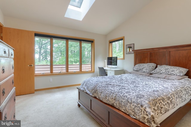 1023 Fairdell Dr, Hummelstown, PA 17036 - bedroom with a skylight, lofted ceiling, light colored carpet, and baseboards