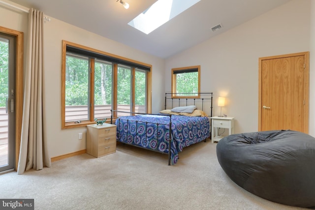 1023 Fairdell Dr, Hummelstown, PA 17036 - bedroom featuring carpet floors, a skylight, vaulted ceiling, baseboards, and access to outside