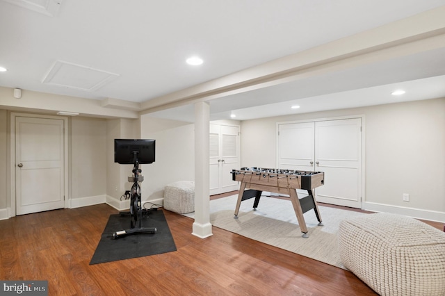 3712 Bradley Ln, Chevy Chase, MD 20815 - recreation room with baseboards, wood finished floors, and recessed lighting