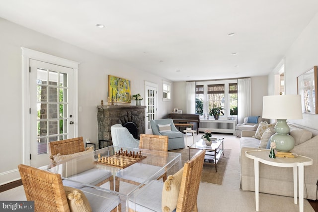 3712 Bradley Ln, Chevy Chase, MD 20815 - dining area featuring radiator, a fireplace, baseboards, and recessed lighting
