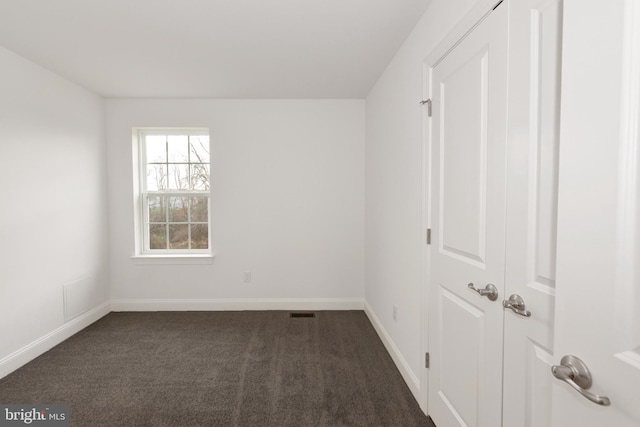 400 Rederick Ln Unit 2Oxford, Middletown, DE 19709 - spare room featuring dark carpet and baseboards
