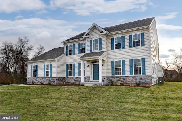 400 Rederick Ln Unit 2Oxford, Middletown, DE 19709 - view of front of house with stone siding, central air condition unit, a front yard, and a shingled roof