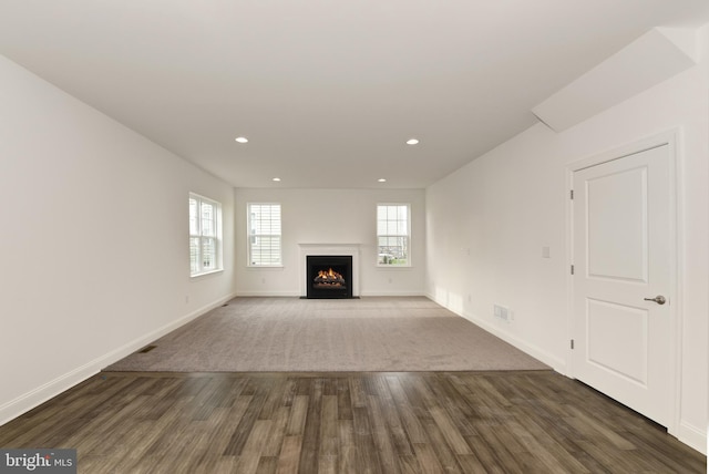 400 Rederick Ln Unit 2Oxford, Middletown, DE 19709 - unfurnished living room with wood finished floors, baseboards, recessed lighting, and a fireplace with flush hearth