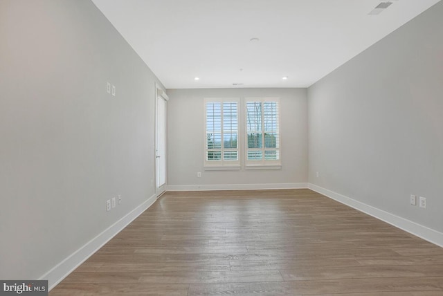 170 Harrier Way Unit 11, Chester, MD 21619 - unfurnished room featuring wood finished floors, baseboards, visible vents, and recessed lighting