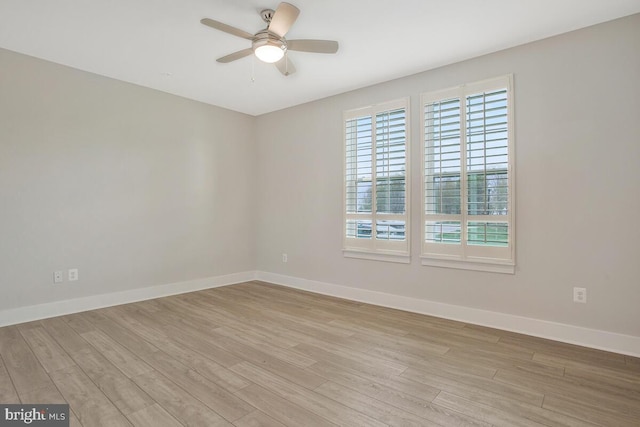 170 Harrier Way Unit 11, Chester, MD 21619 - unfurnished room featuring ceiling fan, light wood finished floors, and baseboards