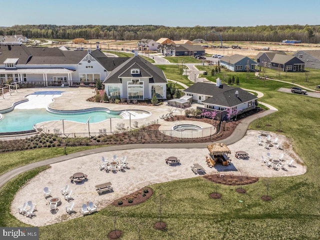 170 Harrier Way Unit 11, Chester, MD 21619 - exterior space with a residential view, a patio area, and an outdoor fire pit