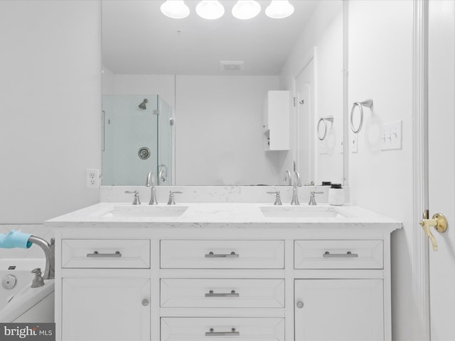 1909 Kenwood Ave Unit 303, Alexandria, VA 22302 - full bathroom with a sink, visible vents, a shower stall, and double vanity