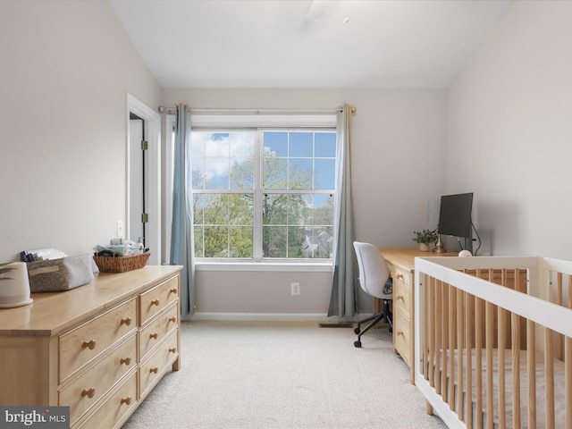 1909 Kenwood Ave Unit 303, Alexandria, VA 22302 - bedroom with light carpet, baseboards, a ceiling fan, and a nursery area