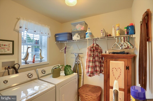 laundry room with independent washer and dryer and laundry area