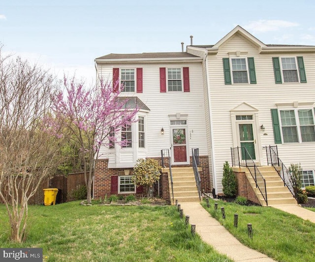 view of property with a front yard
