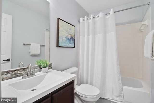 full bath featuring toilet, vanity, and shower / tub combo with curtain