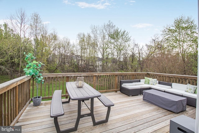 wooden deck featuring outdoor lounge area