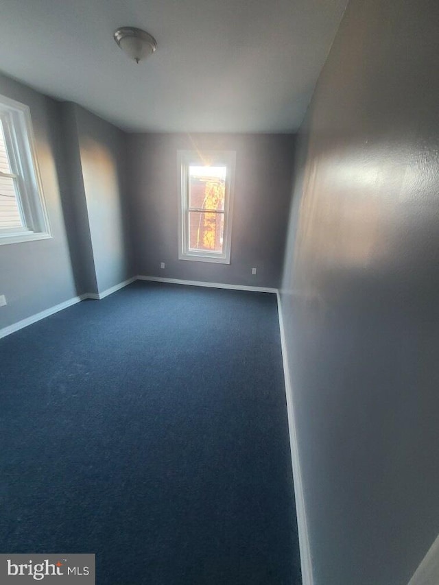 2321 W Lehigh Ave, Philadelphia, PA 19132 - unfurnished room with dark carpet and baseboards